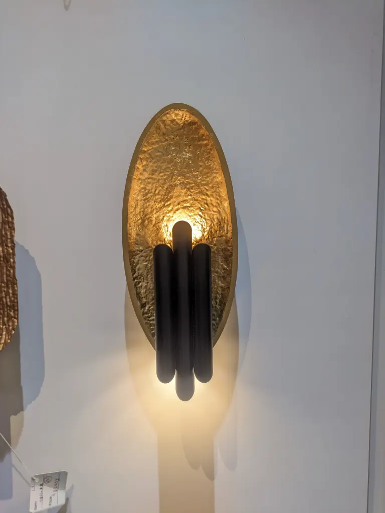 Golden echo wall sconce